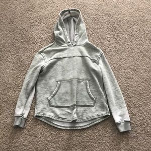 Cat and Jack size medium in kids green jacket.